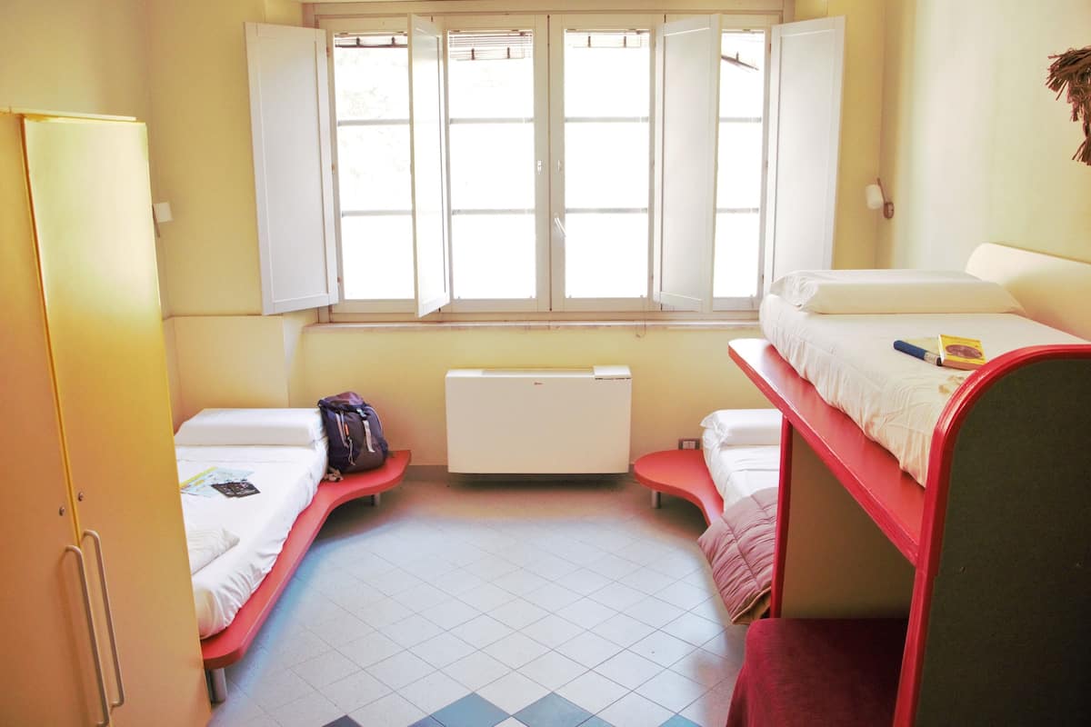 Economy Quadruple Room, Shared Bathroom (Cerussite) | Desk, free cribs/infant beds, rollaway beds, bed sheets