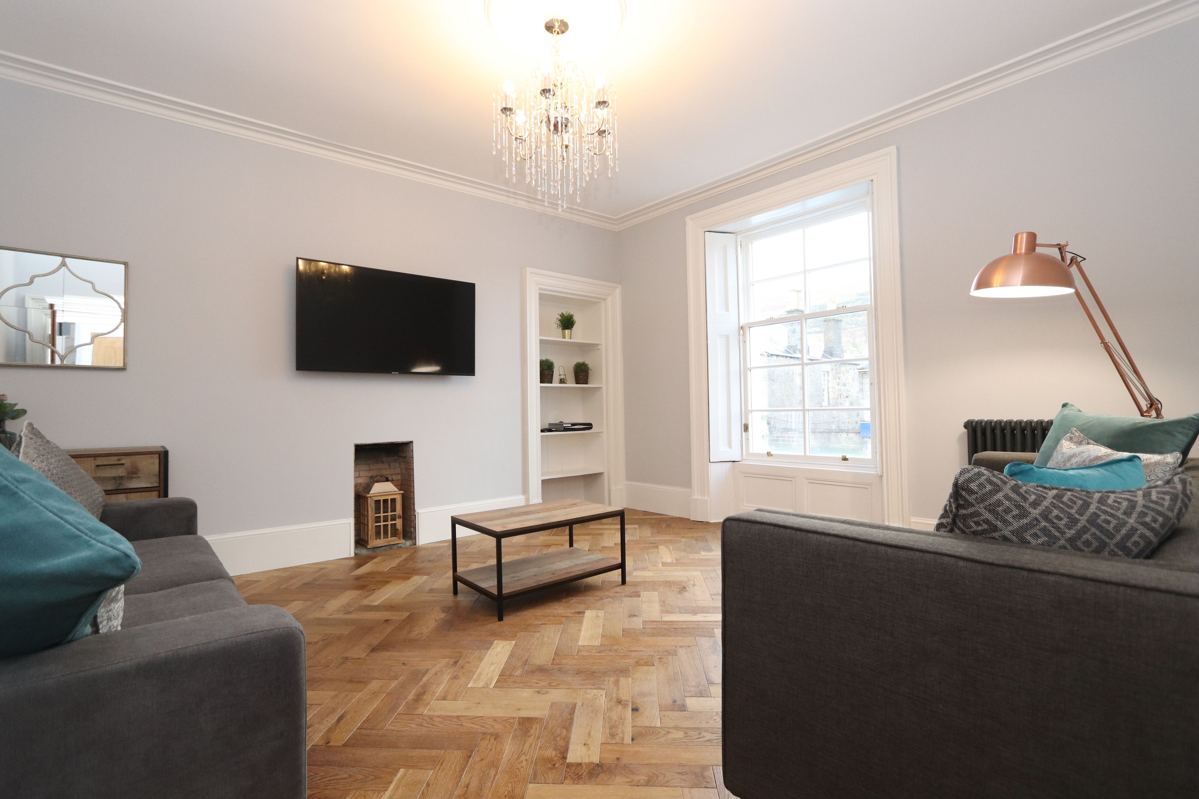 Deluxe Apartment, Multiple Beds | Living room | 49-inch LCD TV with premium channels, TV, Netflix