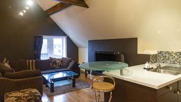 Luxury Apartment | Living area | Flat-screen TV