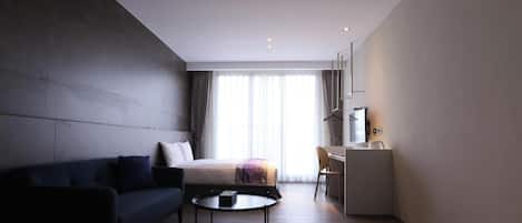 Desk, blackout curtains, free WiFi, bed sheets