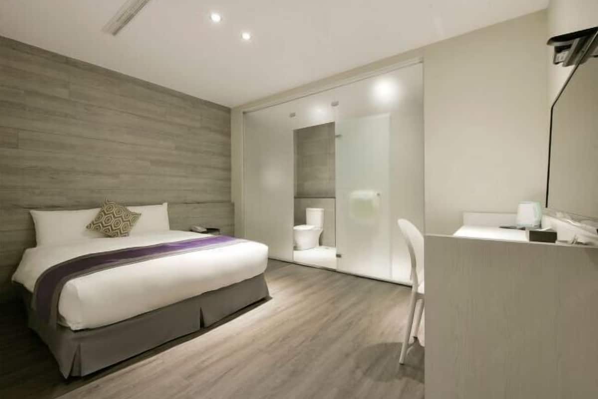 Desk, blackout curtains, free WiFi, bed sheets