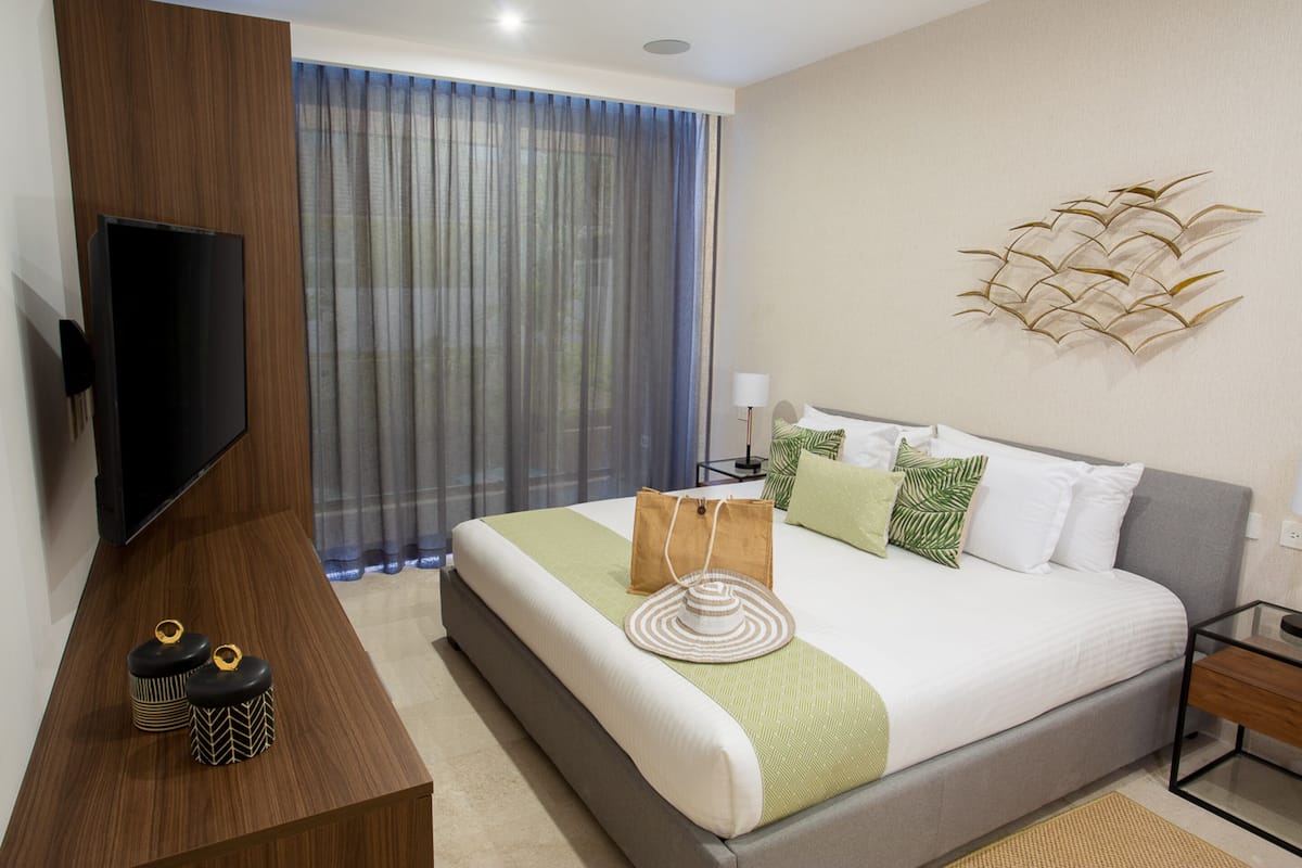 Suite junior | 2 habitaciones, minibar y caja de seguridad en la habitación
