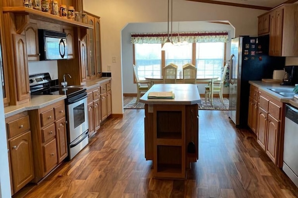 View from living room to kitchen and dining room