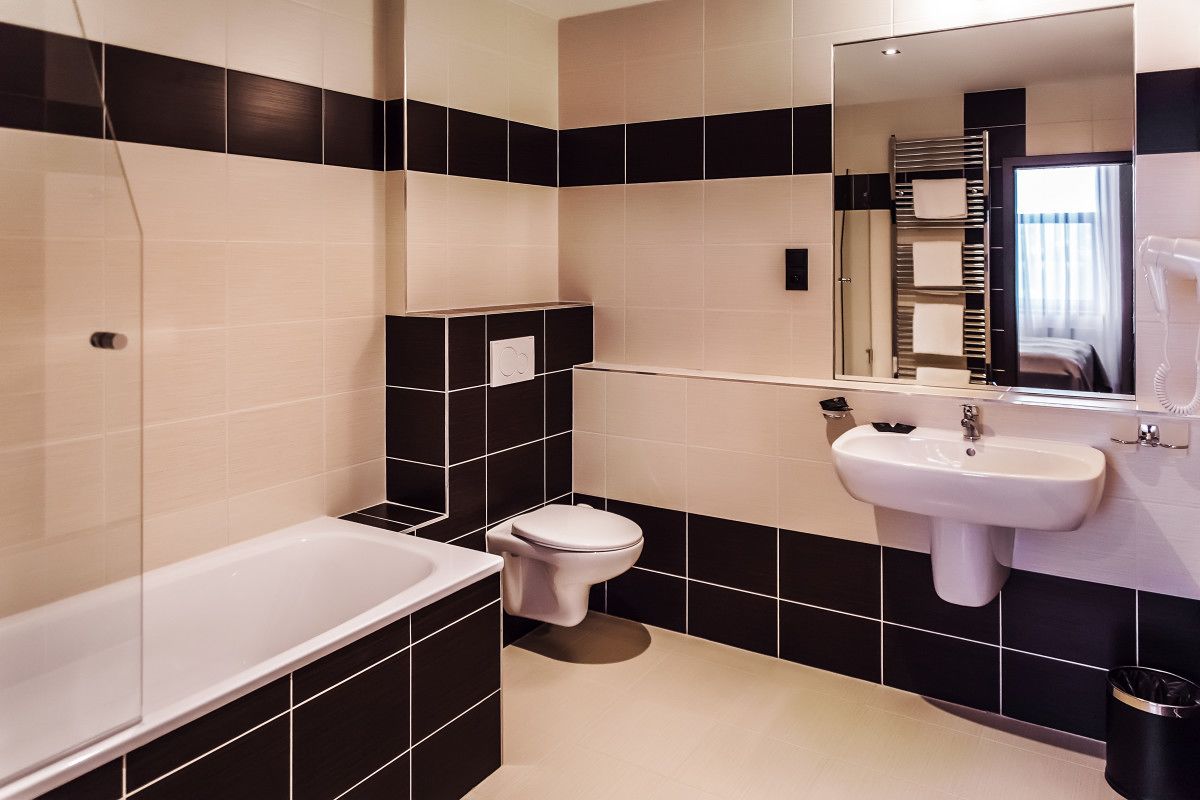 business suite | bathroom | shower, designer toiletries, hair dryer, towels