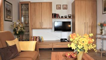 Smart TV, books, music library, stereo