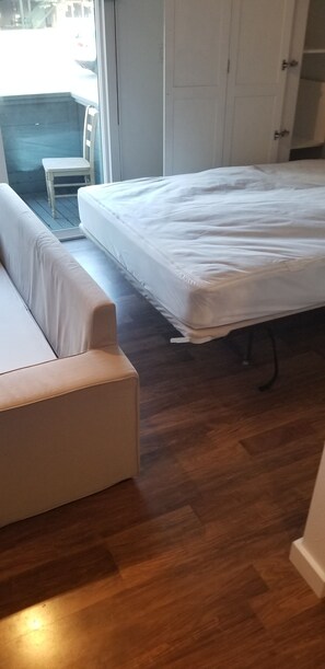 Space between unfolded Murphy bed & sofabed