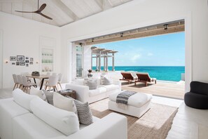 42-inch flat-screen TV with cable channels, TV - Ambergris Cay Private Island - All-Inclusive (Big Ambergris Cay)