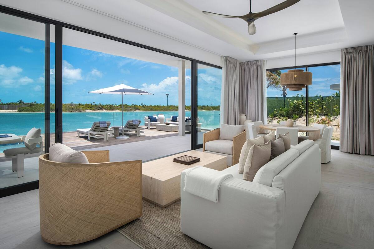Luxury 2 Bedroom Bungalow, Private Pool, Waterside | Living area | 42-inch flat-screen TV with cable channels, TV