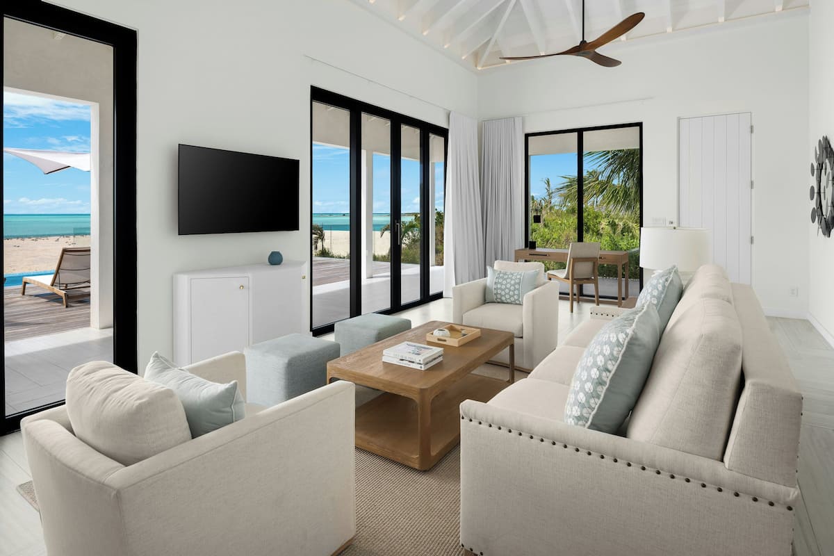 Luxury Bungalow, 2 Bedrooms, Private Pool, Beachfront (Sunset Point) | Living room | 42-inch flat-screen TV with cable channels, TV