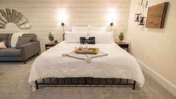 Suite Deluxe, 1 cama King size, para no fumadores | Ropa de cama de alta calidad y cortinas blackout