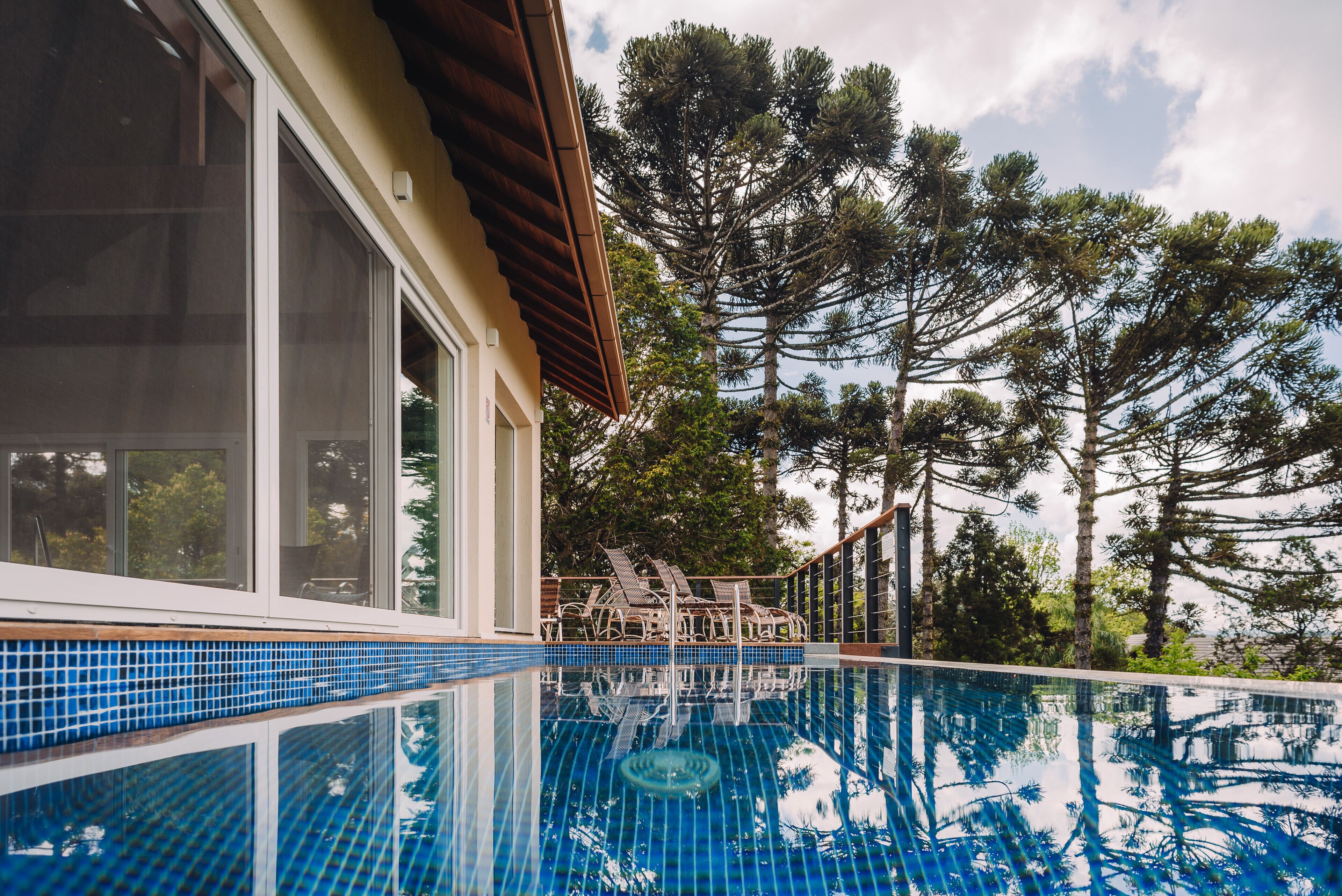 indoor pool, outdoor pool, open 9 am to 9 pm, pool umbrellas