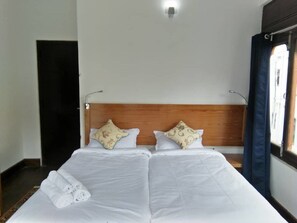 Rollaway beds, free WiFi, bed sheets - Amaa's Suites (Thimphu)
