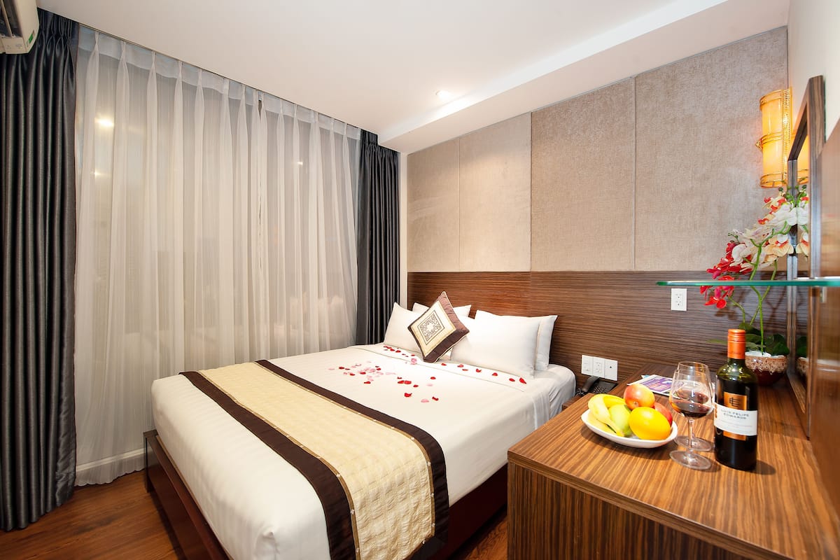 Deluxe Double Room, City View | Minibar, in-room safe, desk, blackout drapes