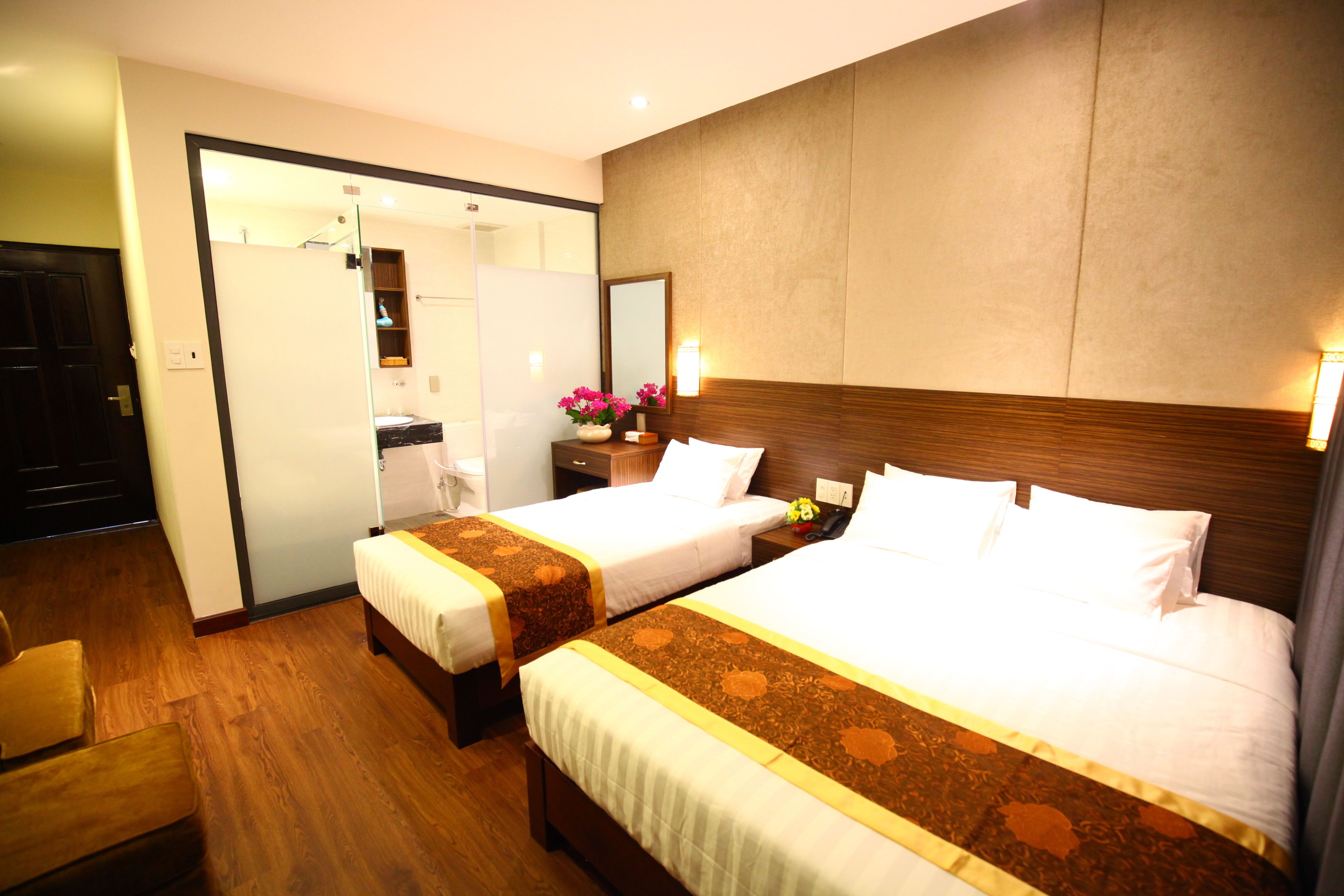 deluxe triple room, city view | minibar, in-room safe, desk, blackout curtains