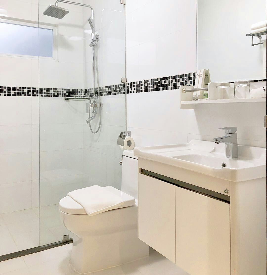 superior double room | bathroom | shower, free toiletries, hair dryer, slippers