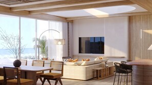 A modern living room with a sofa, dining table, chairs, a TV, and a large window with a view. - Jumeirah Olhahali Island  (Olhahali)