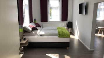 Hypo-allergenic bedding, desk, blackout drapes, soundproofing