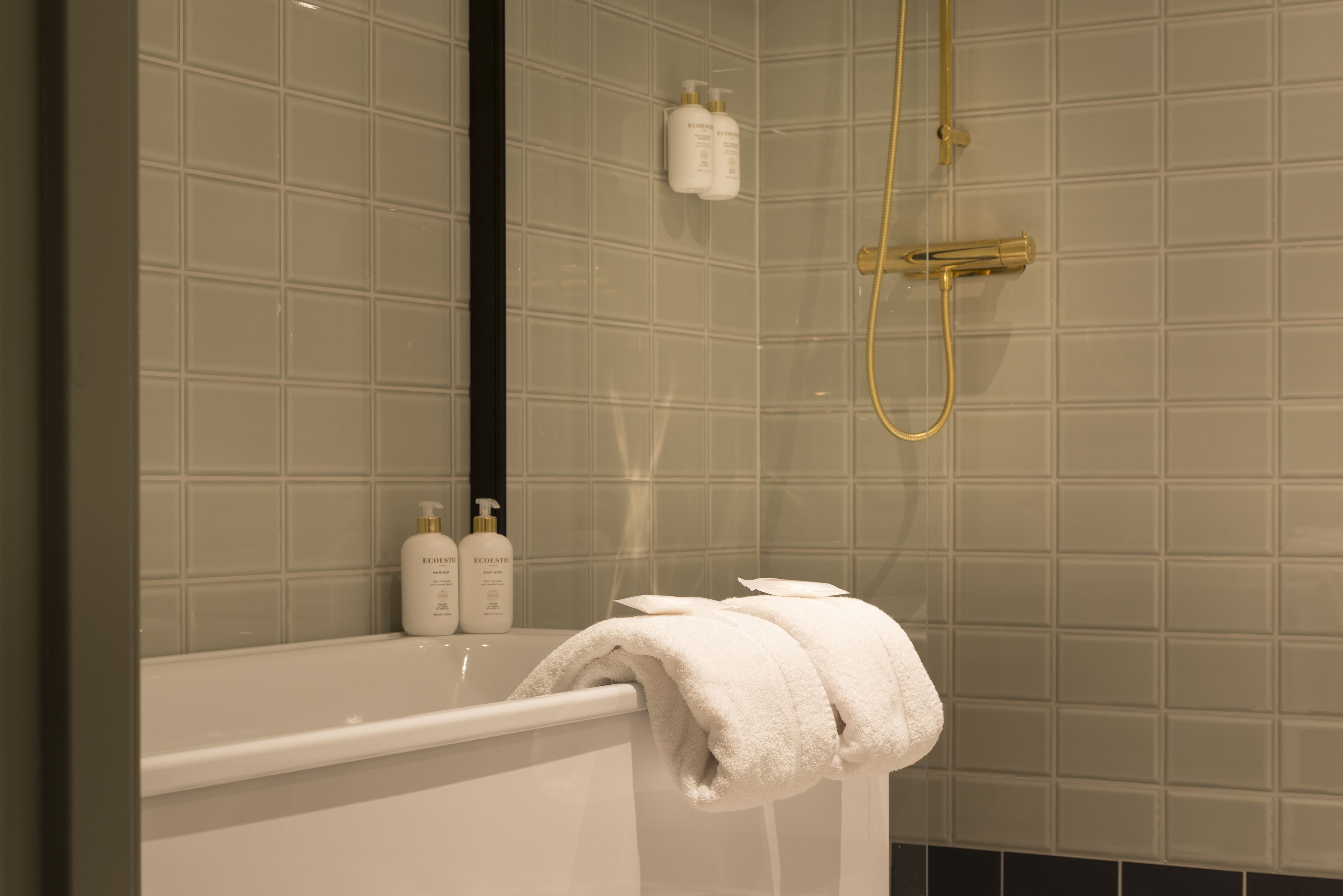 economy room, 2 single beds, non smoking, no windows | bathroom | shower, hair dryer, towels