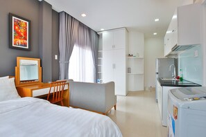 Luxury Studio, Balcony and Windows | Living area | 32-inch flat-screen TV with cable channels, TV - Sunflower Boutique Studio Apartment (Ho Chi Minh City)