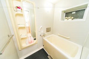 Standard Apartment | Bathroom | Separate tub and shower, free toiletries, hair dryer, slippers