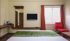 Standard Room, 1 Queen Bed, Non Smoking | Iron/ironing board, rollaway beds, free WiFi, bed sheets - Treebo Champion Comfort (Bengaluru)