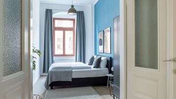 One-bedroom Suite XL | 1 bedroom, desk, laptop workspace, iron/ironing board