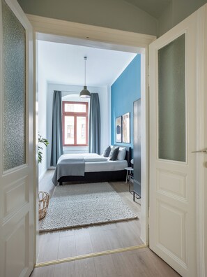 One-bedroom Suite XL | Escritorio y espacio para trabajar con laptop