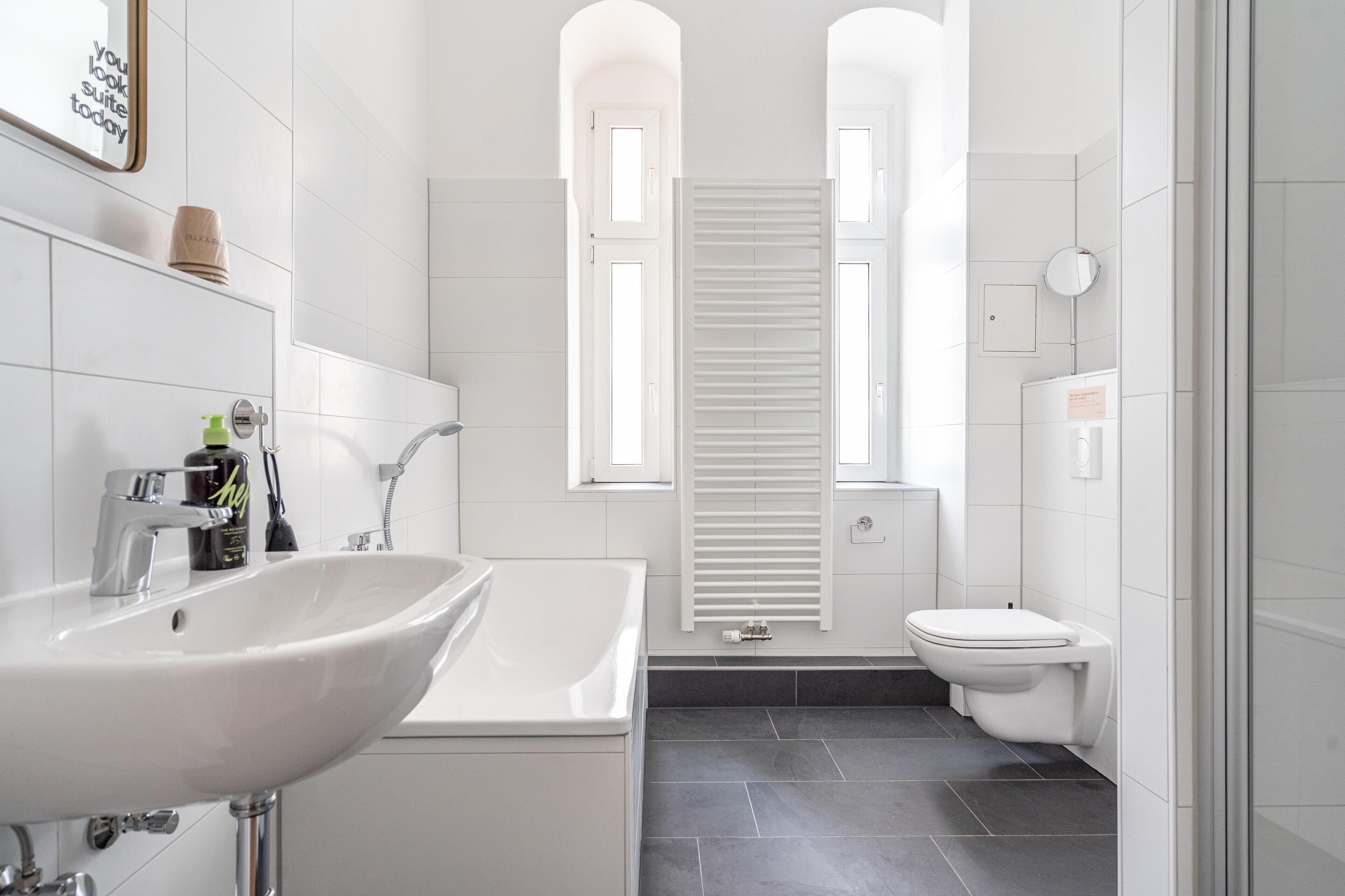 Two-Bedroom Suite XL | Bathroom | Hair dryer, towels