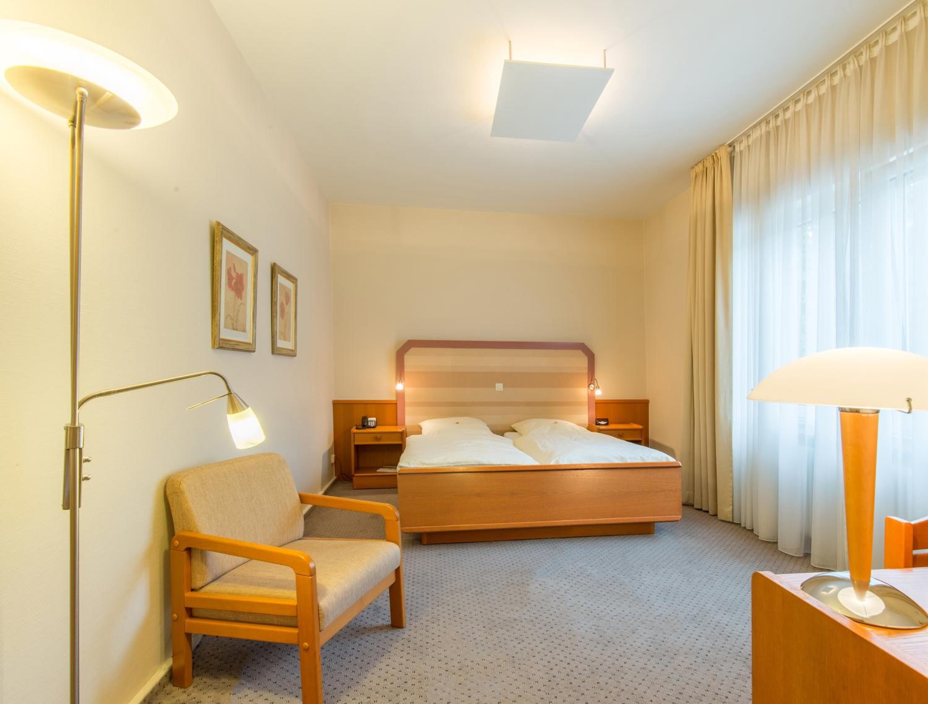 minibar, desk, laptop workspace, blackout curtains