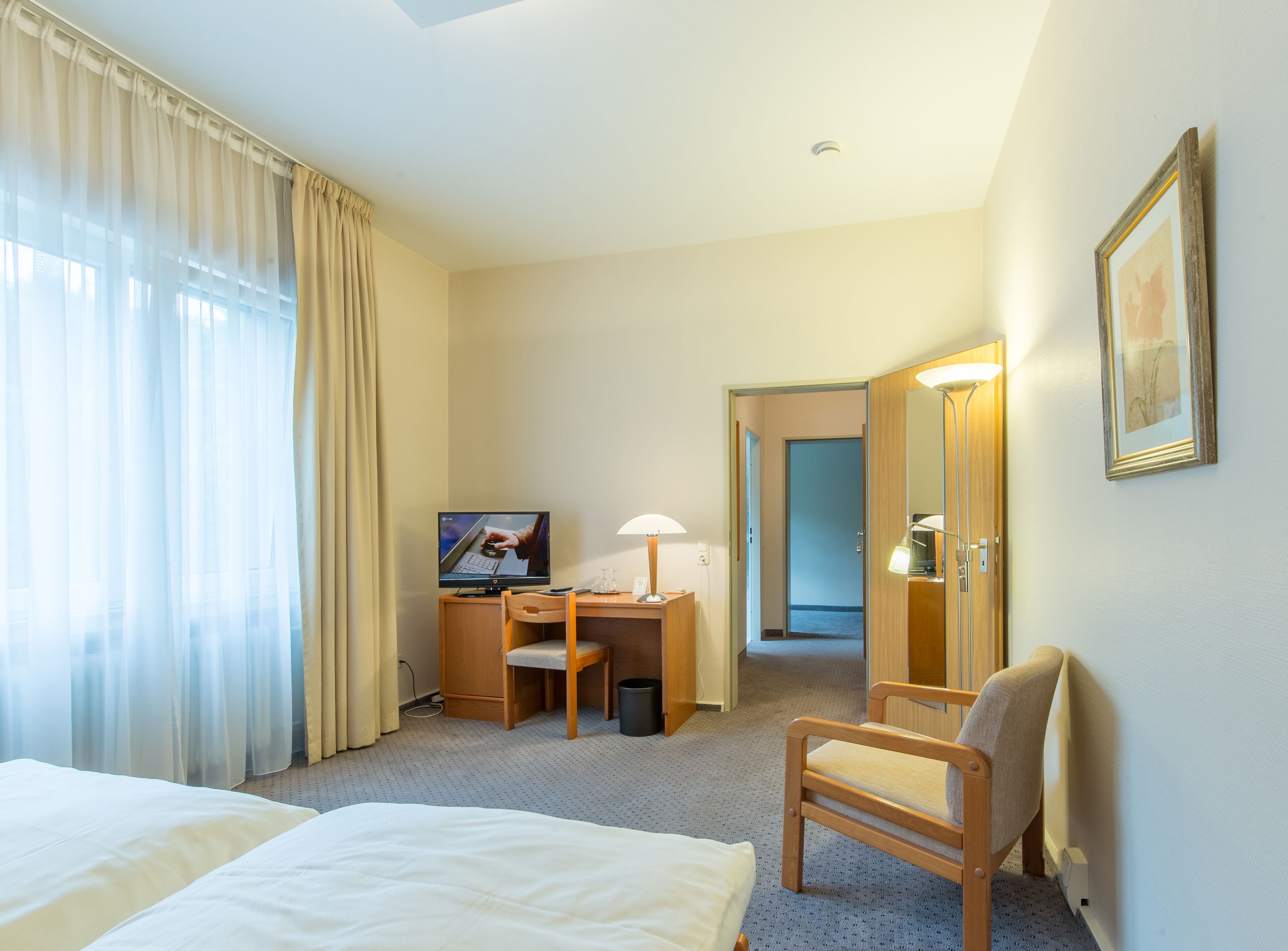 minibar, desk, laptop workspace, blackout curtains