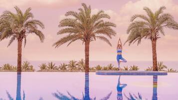 2 outdoor pools, pool umbrellas, pool loungers