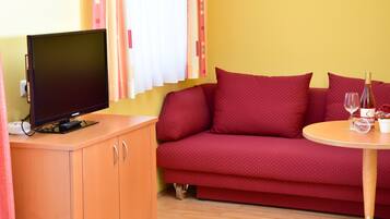 Premium-Doppelzimmer | Wohnzimmer | Flachbildfernseher
