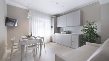 Family Apartment, 2 Bedrooms, 2 Bathrooms | Premium bedding, down duvets, memory-foam beds, in-room safe