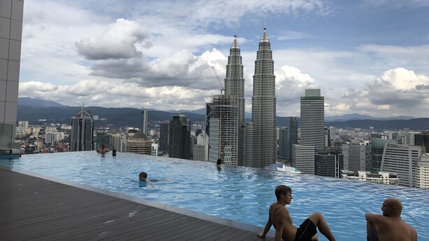 An infinity pool with a view of the Petronas Towers and surrounding cityscape. - LUMA At Platinum Suite (Kuala Lumpur)