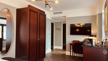Premium bedding, down comforters, Tempur-Pedic beds, free minibar