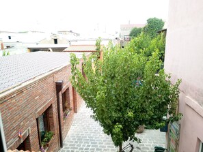 Chambre Économique avec lits jumeaux | Vue sur le jardin