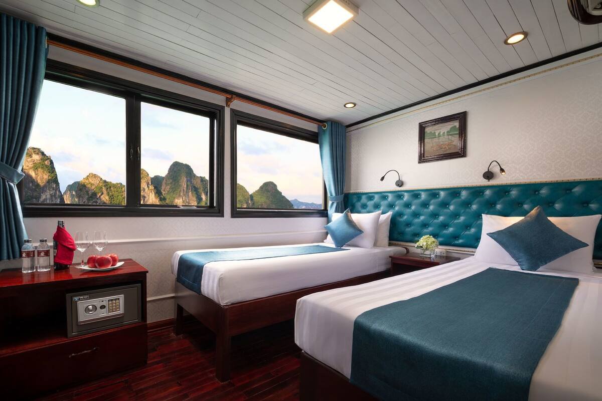 Quarto duplo luxo, vista para o mar | Frigobar, cofres nos quartos, escrivaninha, Wi-Fi de cortesia
