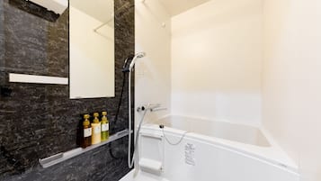 Separate bathtub and shower, hair dryer, slippers, electronic bidet