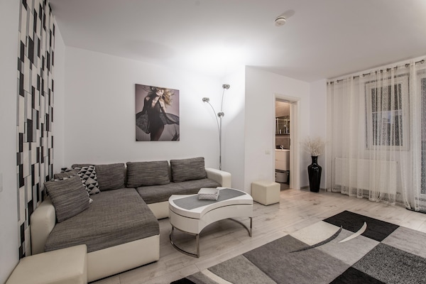 Luxury Studio Suite, Accessible | Living room | 31-inch LED TV with cable channels, TV, Netflix