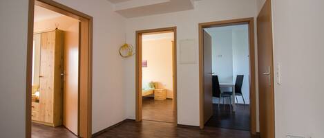 Apartment, 3 Bedrooms | Living area | Flat-screen TV