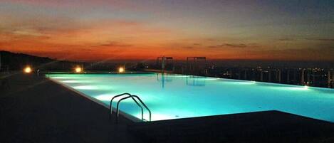 Seasonal outdoor pool, open 10 AM to 7 PM, pool loungers