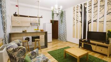 Superior Studio, 1 Bedroom | Living area | 30-inch LCD TV with cable channels, TV, fireplace