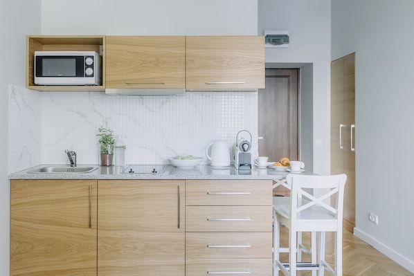 City Apartment | Private kitchenette | Full-size fridge, microwave, stovetop, espresso maker