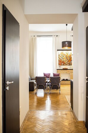 Deluxe Apartment, 3 Bedrooms, Non Smoking | Living room | 30-cm flat-screen TV with cable channels, TV