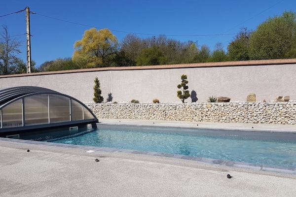 Seasonal outdoor pool, open 11:30 AM to 7:30 PM, pool umbrellas
