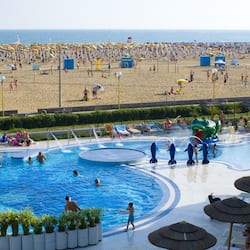 Seasonal outdoor pool, open 9 AM to 7 PM, pool umbrellas, pool loungers