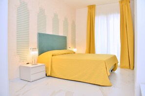 Leilighet (Oman Room Sud Mare) | Safe på rommet, strykejern/-brett og wi-fi (inkludert)