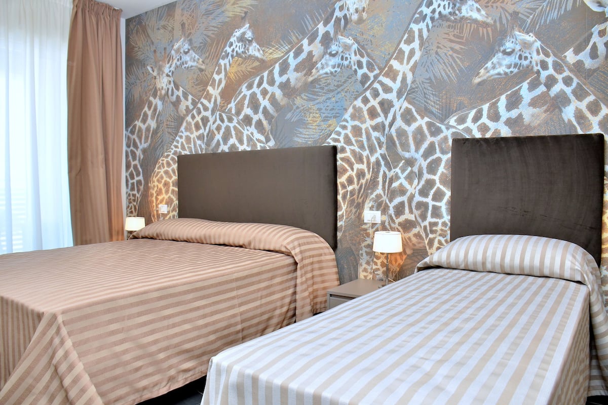 Appart'hôtel (Savana Room Sud Mare) | Coffres-forts dans les chambres, fer et planche à repasser