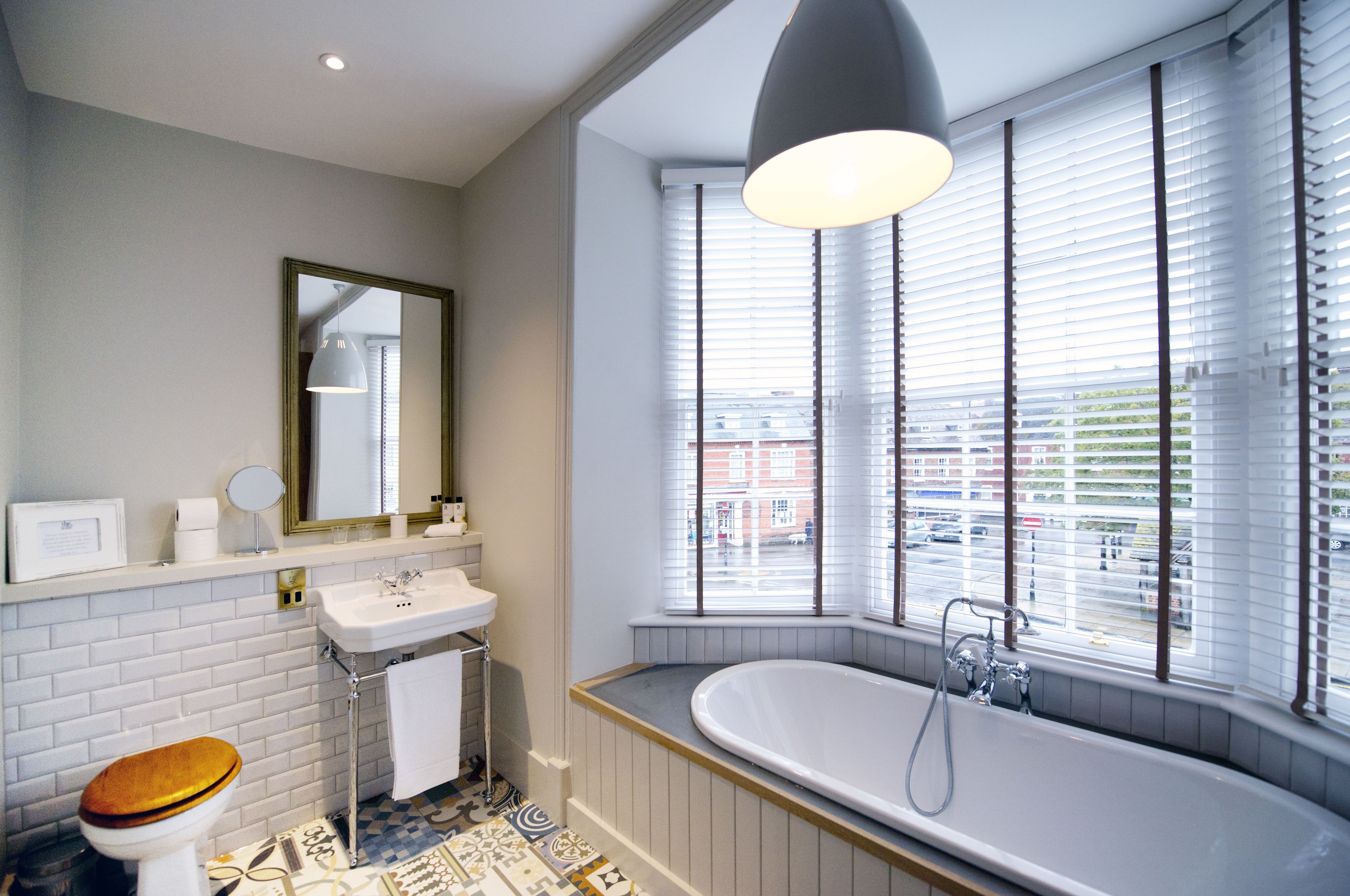 shower, rainfall showerhead, hair dryer, towels