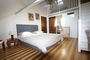 Double Room (Duplex) | Minibar, in-room safe, individually decorated, individually furnished